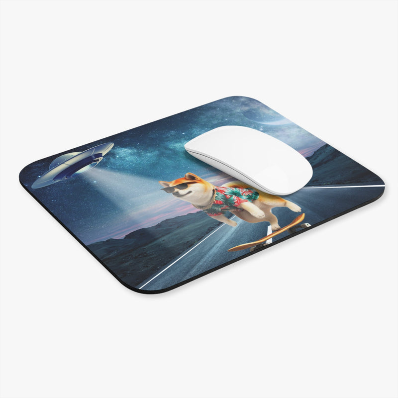 Flat-lay of sci-fi themed dog mouse pad featuring alien abduction scene