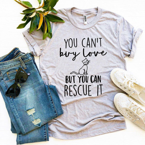 Light gray rescue-themed T-shirt with jeans, hat, and heels flat lay