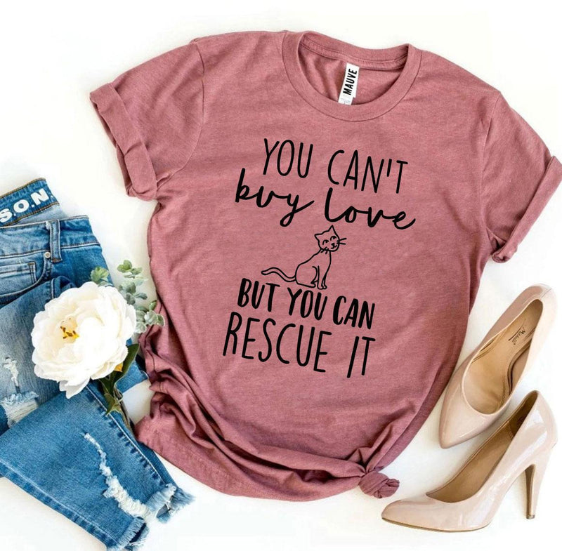 Maroon "Rescue Love" T-shirt laid out with denim and nude heels for casual look