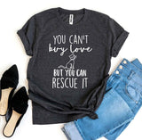 Black "You Can’t Buy Love But You Can Rescue It" T-shirt styled with blue jeans and black flats