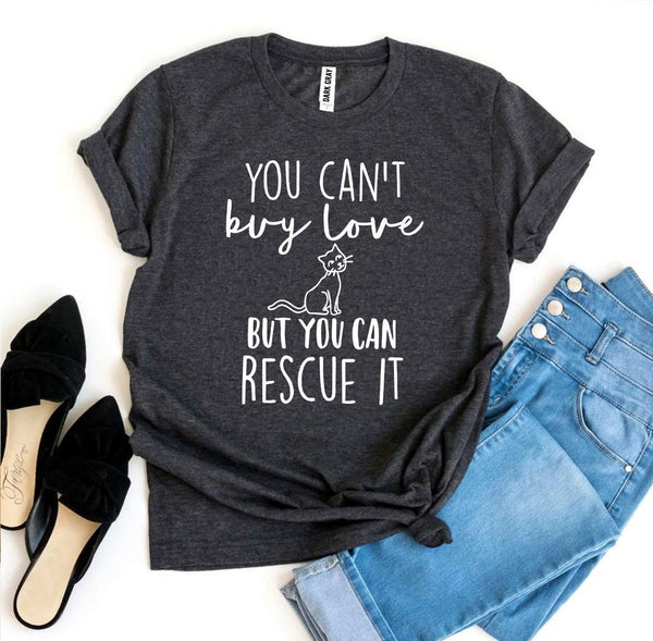 Black "You Can’t Buy Love But You Can Rescue It" T-shirt styled with blue jeans and black flats