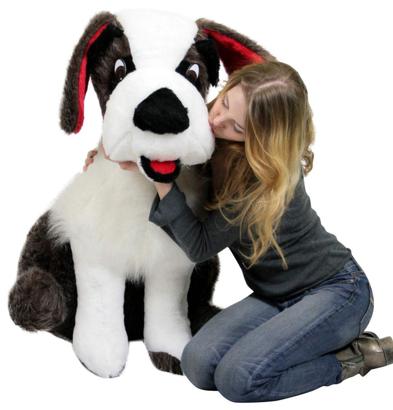 Close-up of life-size realistic Saint Bernard plush toy with red ears